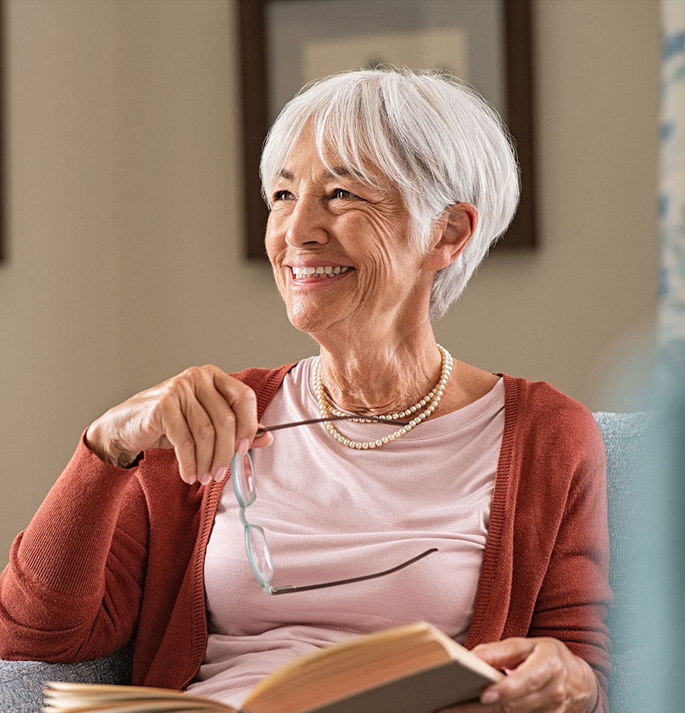 senior woman with dentures smiling